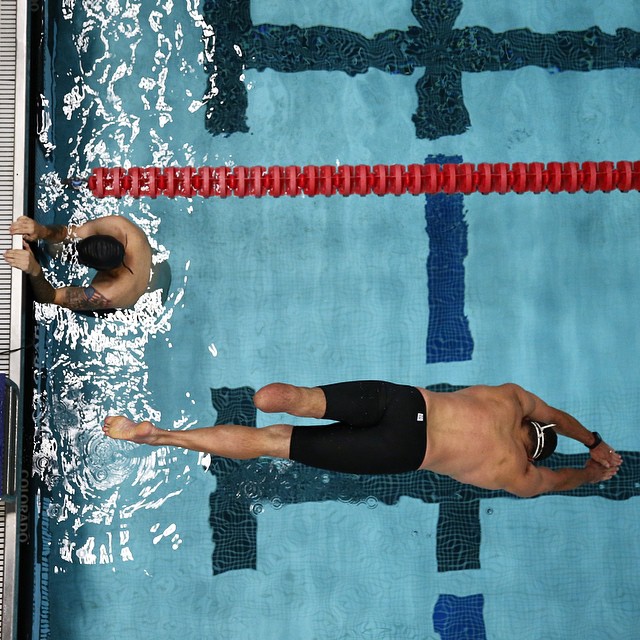 Army's Brian Boone warms up before the swimming events at